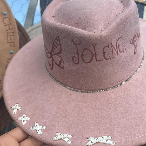 Pink suede hat hand-burned with Jolene lettering and a butterfly