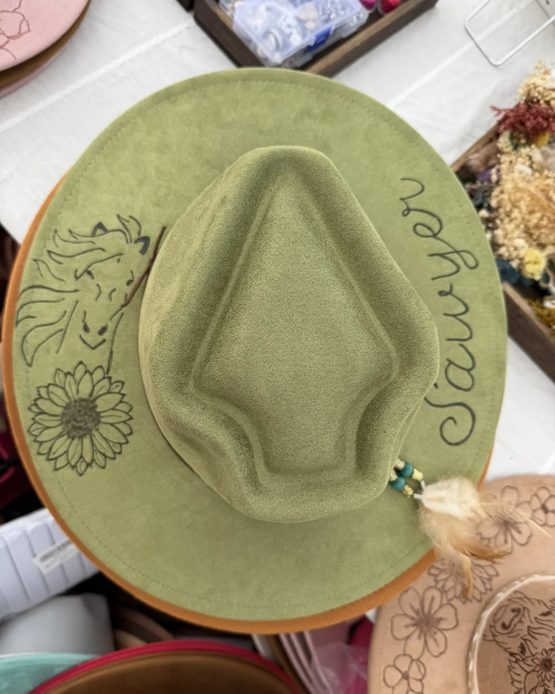 Sage green suede hat hand-burned with a horse, a sunflower, and the name Sawyer